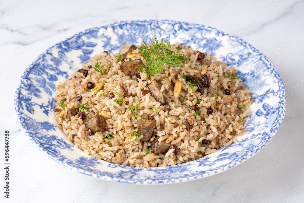 Traditional delicious Turkish food; rice pilaf with pine nuts and currants (Turkish name; ic pilav or pilaf) Traditional delicious Turkish food; rice pilaf with pine nuts and currants (Turkish name; ic pilav or pilaf)
