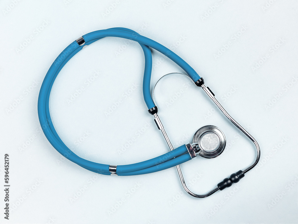Lodz Poland April 25 2023 Medical stethoscope tool on blue background, top view