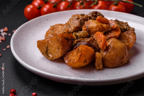 Delicious fresh cooked stew with pork meat or beef with potatoes, carrots, spices and herbs