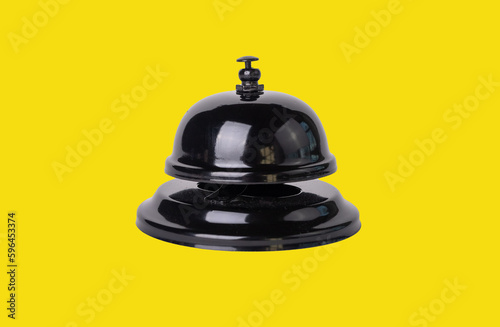 Reception bell on yellow background