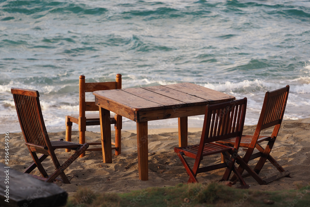 Empty picnic table on tropical beach.