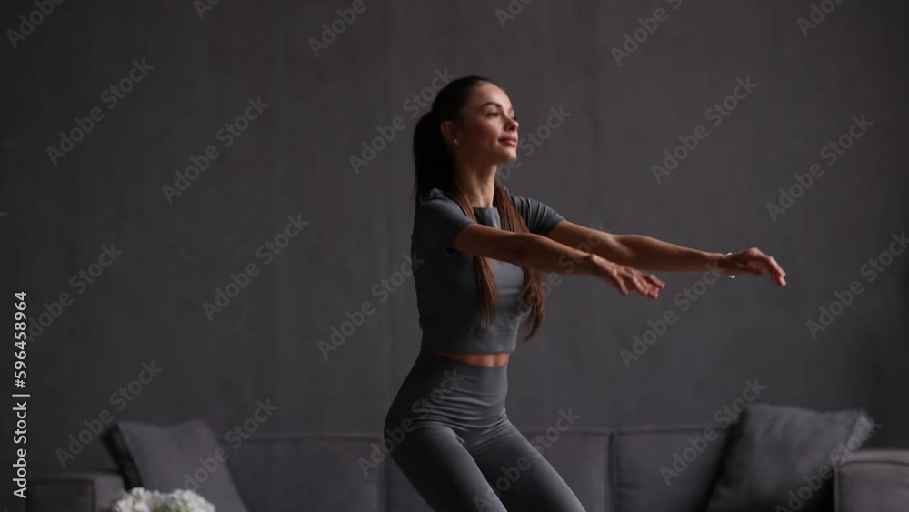 Young fit woman make sit ups exercises at home Young fit woman make sit ups exercises at home