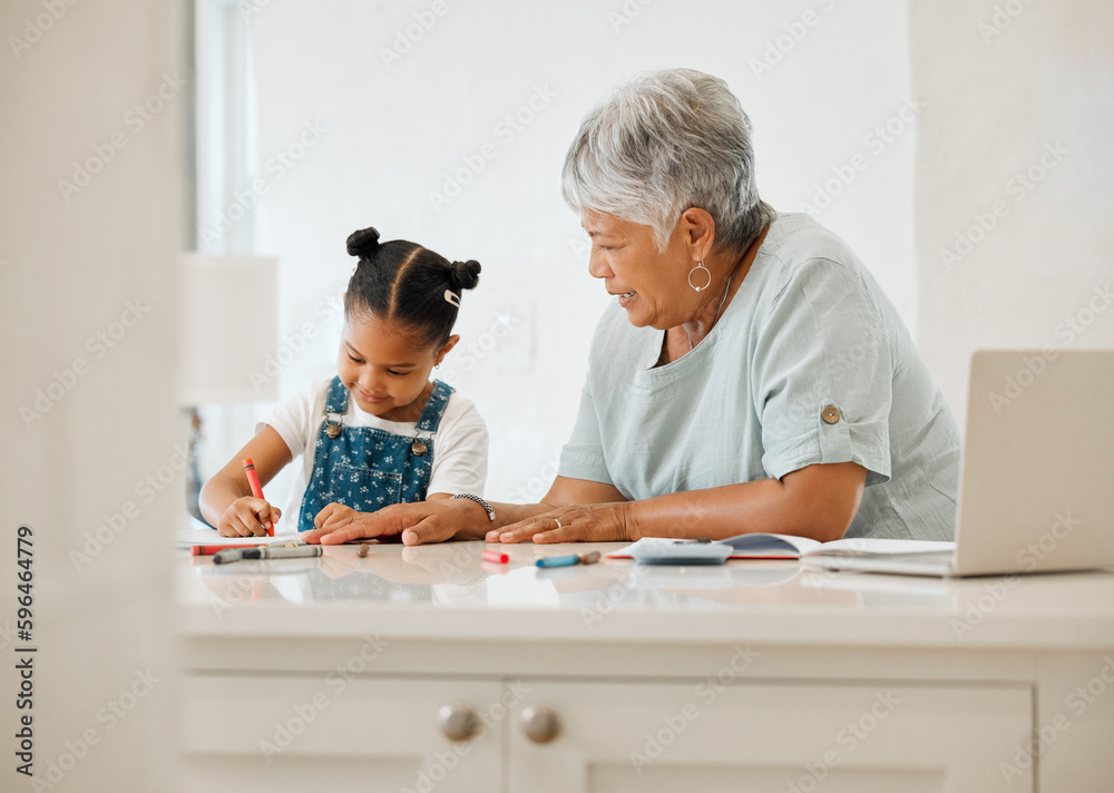 Can I draw too. Shot of a grandma helping her granddaughter at the kitchen table at home. Can I draw too. Shot of a grandma helping her granddaughter at the kitchen table at home.