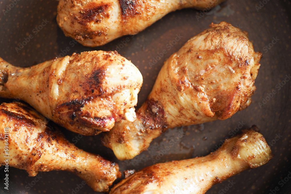 Grilled chicken fillets on plate. top down. Grilled chicken fillets on plate. top down.