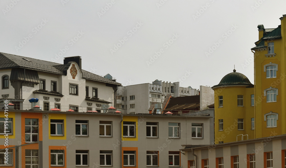 Panorama of beautiful houses, newly built modern family houses. City street on a sunny day.