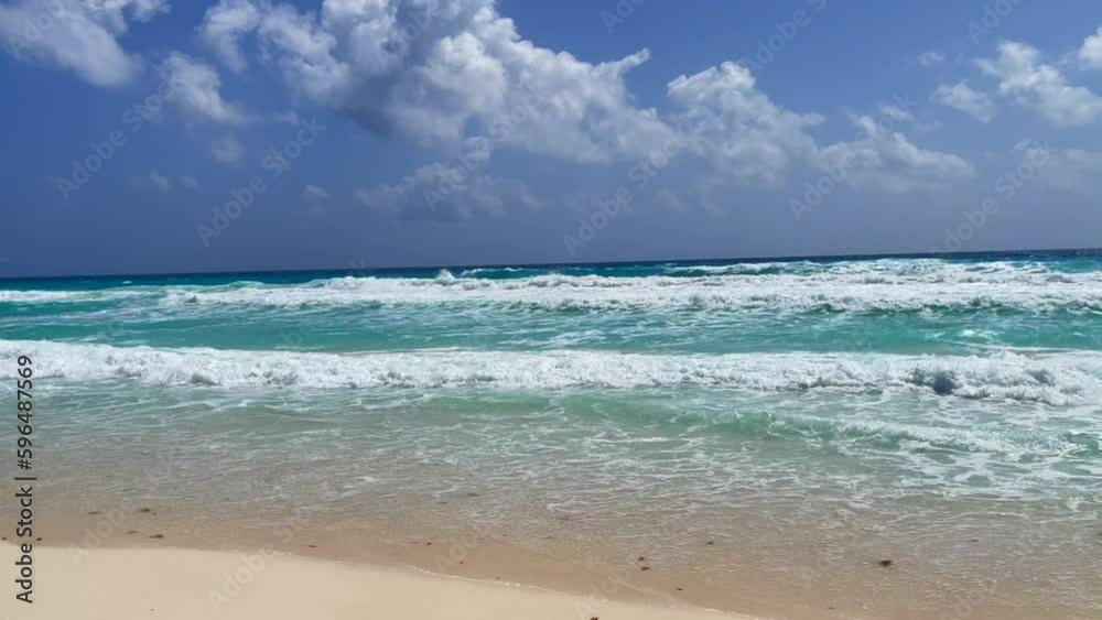 4k video of beautiful Beach with waves crashing on shore in Cancun, Mexico 4k video of beautiful Beach with waves crashing on shore in Cancun, Mexico