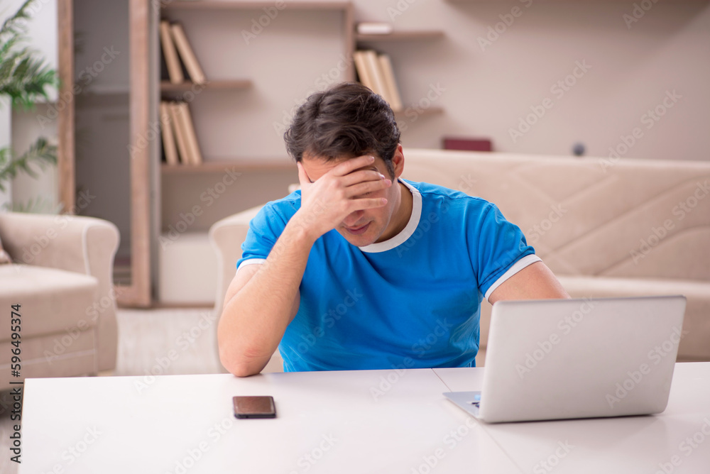 Young man freelancer working from home Young man freelancer working from home
