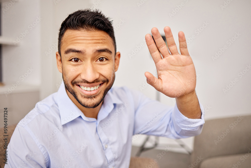Hi there Im happy to meet you. Shot of a young businessman waving during a video call. Hi there Im happy to meet you. Shot of a young businessman waving during a video call.