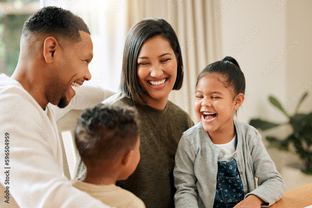 They love just chilling with mom and dad. Shot of a young family bonding together at home.