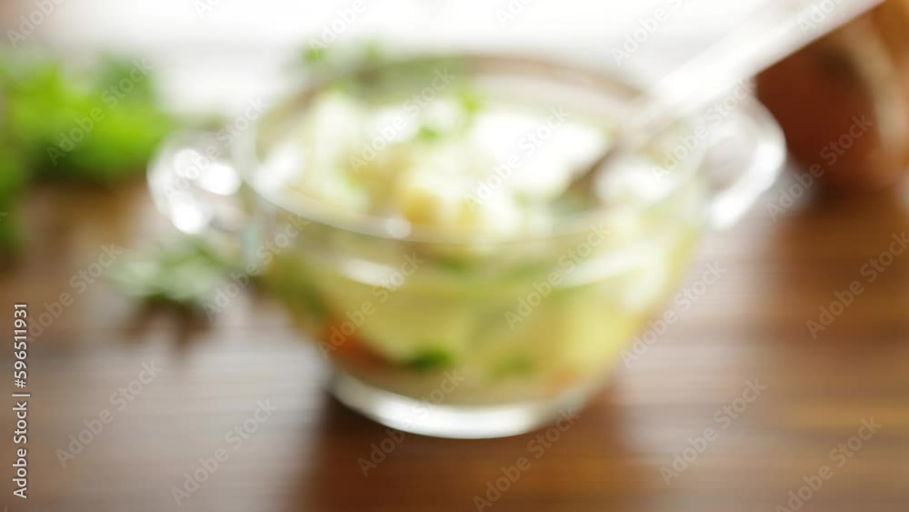 cooked chicken soup with cauliflower and vegetables in a bowl cooked chicken soup with cauliflower and vegetables in a bowl