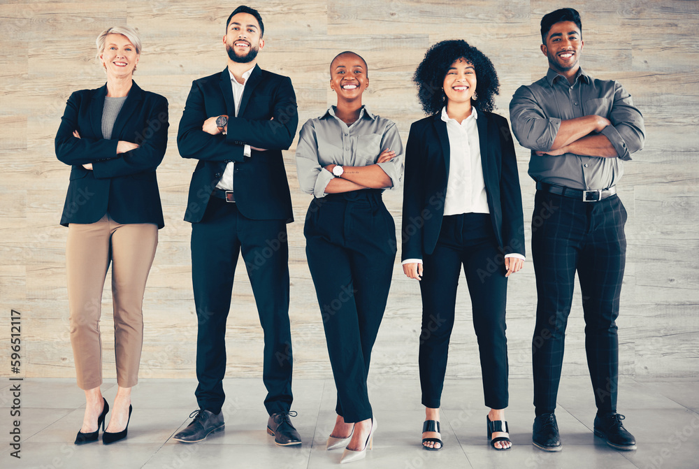 People rarely succeed unless they have fun. Shot of a group of businesspeople standing with their arms crossed in an office at work.