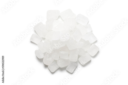 heap of white rock sugar on white background photo