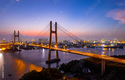 Sunset at Phu My bridge, Saigon riverside, Ho Chi Minh city, Vietnam. April 2023 © Moon Cactus