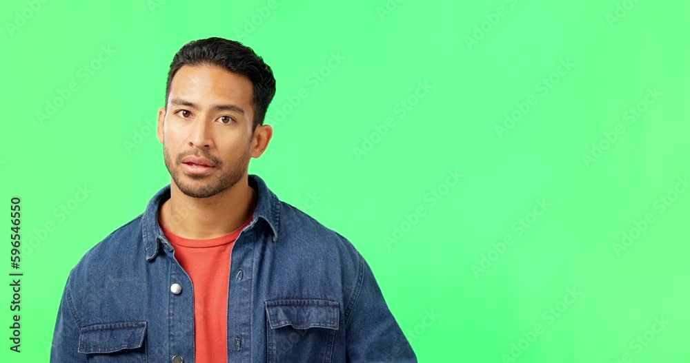 Portrait, hand gesture and no with a man on a green screen background in studio waving his finger. Stop, warning and negative with a young person in disagreement or conflict on chromakey mockup Portrait, hand gesture and no with a man on a green screen background in studio waving his finger. Stop, warning and negative with a young person in disagreement or conflict on chromakey mockup