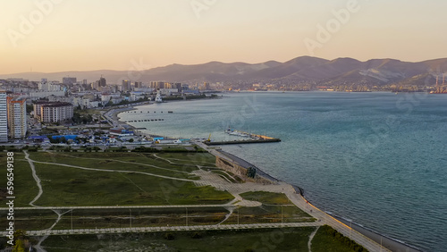 Novorossiysk, Russia - September 16, 2020: City embankment. Tsemesskaya Bay in the Black Sea., Aerial View © nikitamaykov