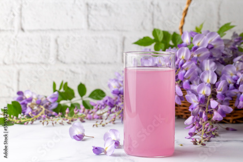 Drink for health made from Wisteria sinensis flower. Wisteria sinensis sherbet. Turkish name; Mor salkim serbeti photo