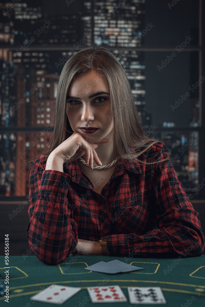 Caucasian girl in the casino playing poker, night lifestyle Caucasian girl in the casino playing poker, night lifestyle