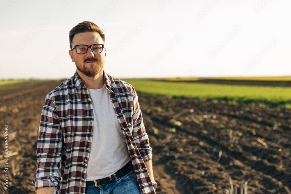 Portrait of a farmer standing in the field Portrait of a farmer standing in the field