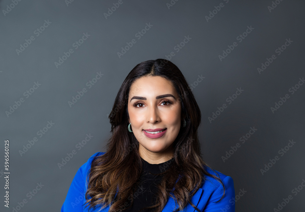 Fototapeta premium portrait of latin business woman smiling looking at camera