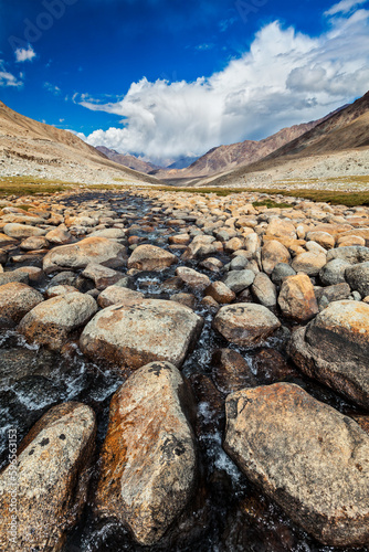 Mountain stream with stones in Himalayas