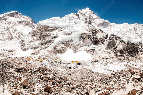 Bright yellow tents in Mount Everest Base Camp, Khumbu glacier and mountains, Sagarmatha national park, Nepal, Himalayas
