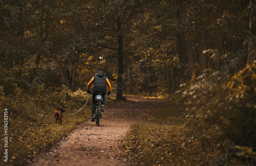 Cycling with dog in a public park