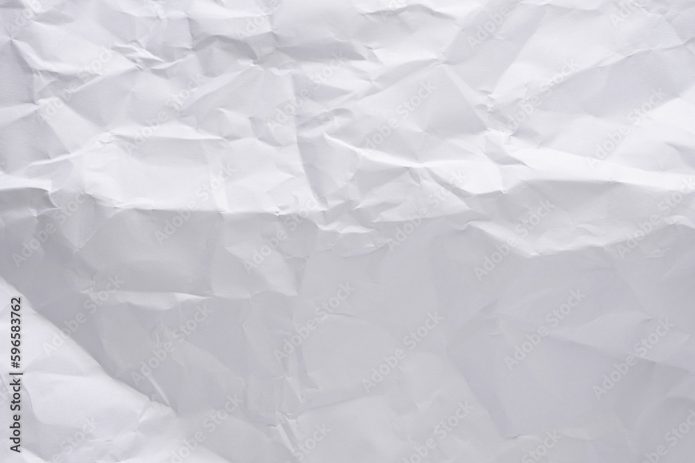 White crumpled paper texture background, clean white wrinkled paper, top view. White crumpled paper texture background, clean white wrinkled paper, top view.