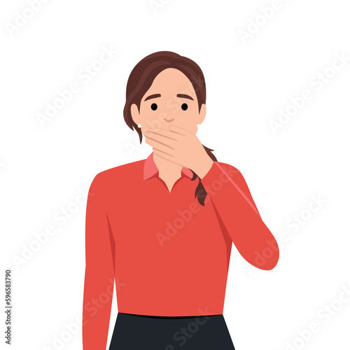 Shocked young woman covering mouth with both hands while eyes open widely. Woman covering mouth with hand. Human emotion and body language concept