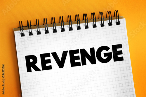 Revenge - hurt someone in return for being hurt by that person, text concept on notepad photo