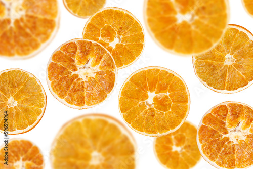 Levitation of dry orange slices isolated on transparent background.