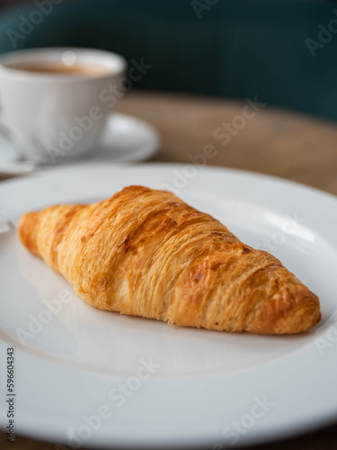 croissant and cup of coffee