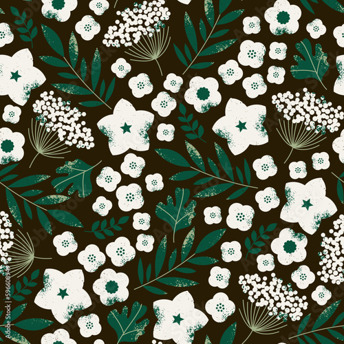 Beautiful wild flowers and leaves collection. White flowers on the dark background.
