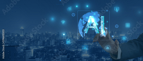 Businessman pressing artificial intelligence (AI) icon on virtual screen.