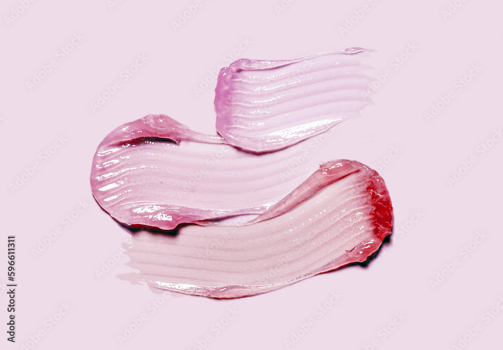 Fototapeta premium Cream balm cosmetic texture smudge or lip gloss on pastel pink background