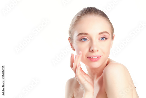 Beautiful face of young smiling woman with clean fresh skin - isolated on white.