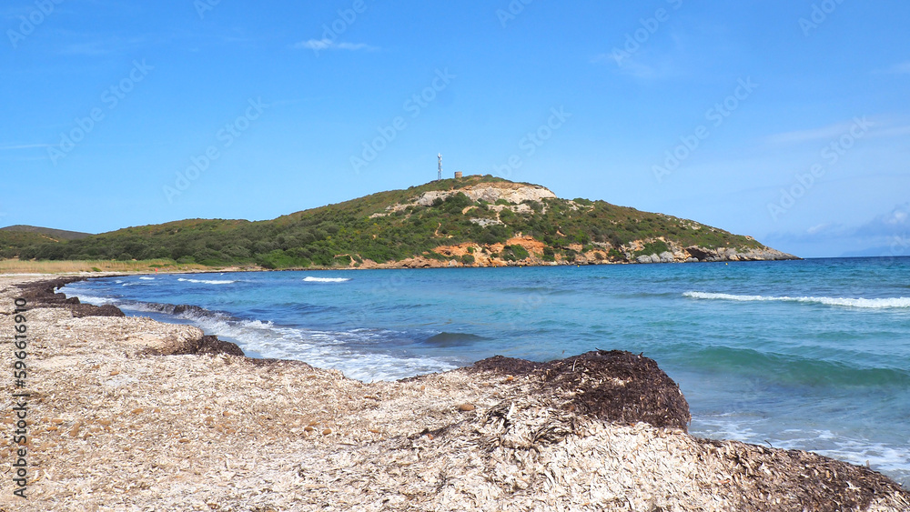 panoramic view of Rogliano beach dominated by a Genoese tower near Cap Corse, in Corsica nicknamed the island of beauty