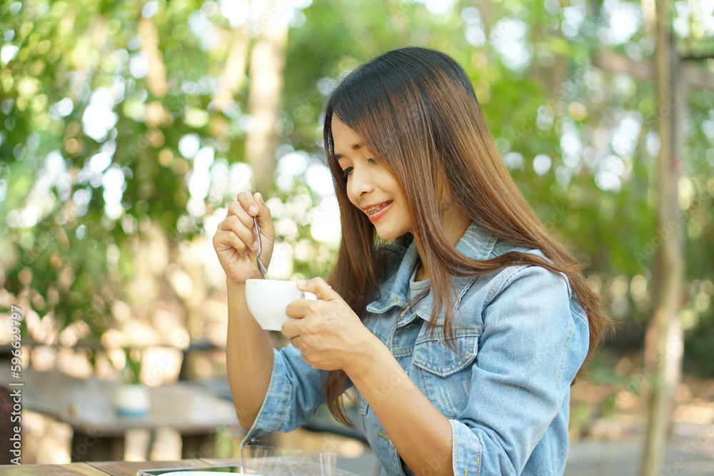 Woman drinking coffee in the morning before work Woman drinking coffee in the morning before work