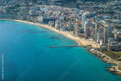 modern apartments, Cantal Roig beach and sailboats and fishing boats in the port of Calpe. Top view, horizontal © Piotr