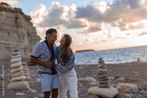 couple enjoying the company of each other at beach