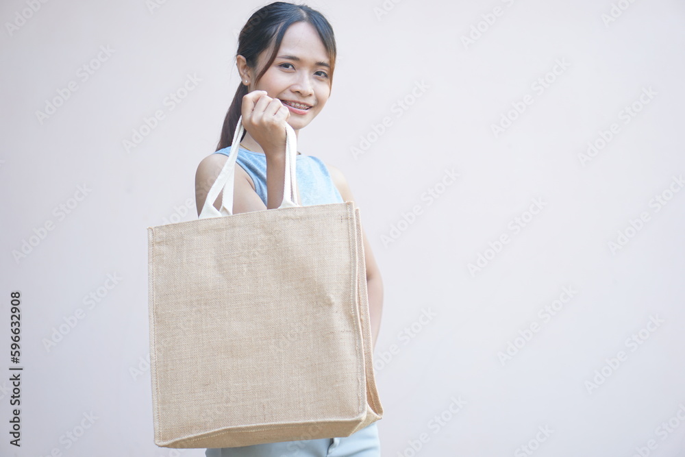 world plastic free day Women use cloth bags instead of plastic bags for
