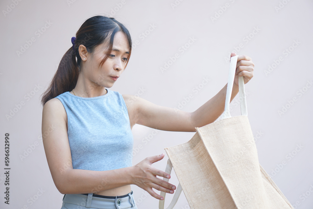 world plastic free day Women use cloth bags instead of plastic bags for