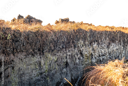 Peat Turf cutting in County Donegal - Ireland photo