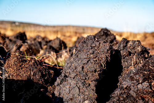 Peat Turf cutting in County Donegal - Ireland photo