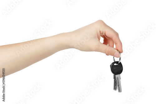 Hand holding keys to apartment on white background.