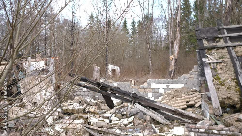 Ruins of an abandoned building in the woods, radioactive contamination of the area Ruins of an abandoned building in the woods, radioactive contamination of the area