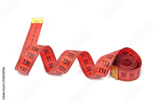 Red spiral tape measure diet isolated over white background clipping path.