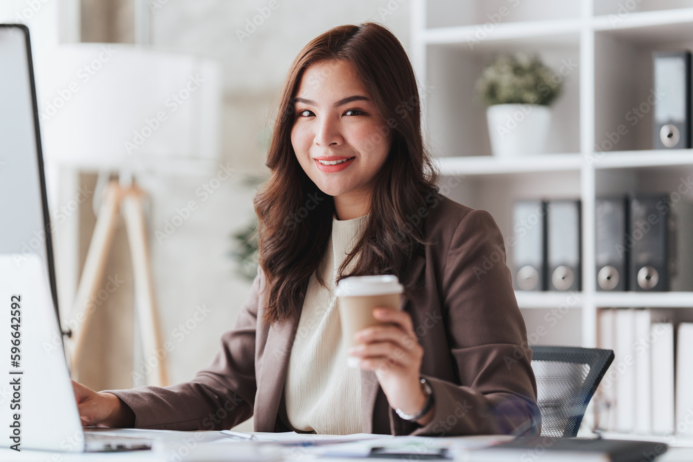 Accountant woman working on laptop and do document, tax, exchange, research, accounting and Financial advisor concept Accountant woman working on laptop and do document, tax, exchange, research, accounting and Financial advisor concept