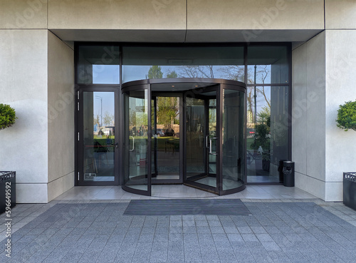 Automatic modern black rotating doors office mockup