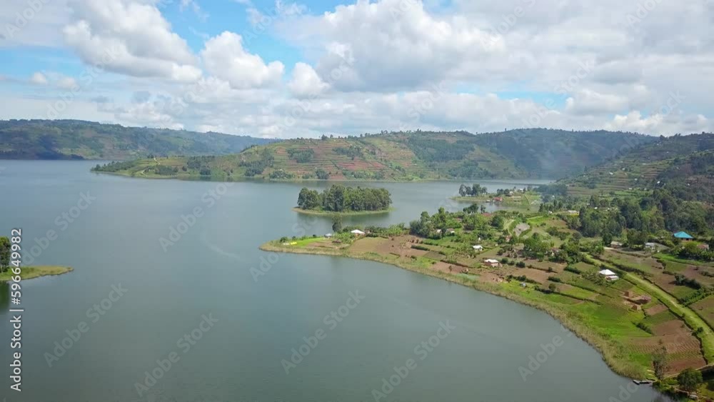 Verdant Islands On Lake Bunyonyi In Daytime In Uganda, Africa. - aerial Verdant Islands On Lake Bunyonyi In Daytime In Uganda, Africa. - aerial