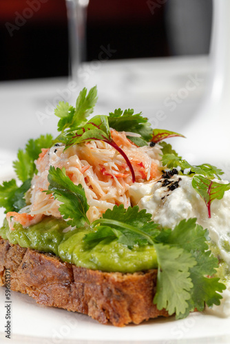 Bruschetta with poached egg and crab meat